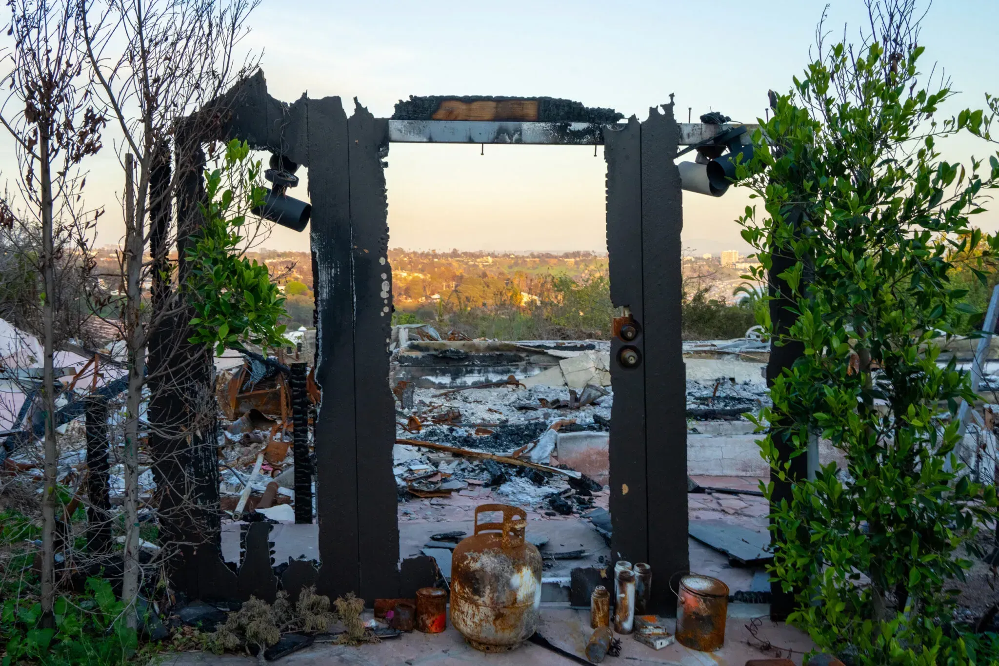 A Neighborhood Burned, a Home Saved, a Future in Question